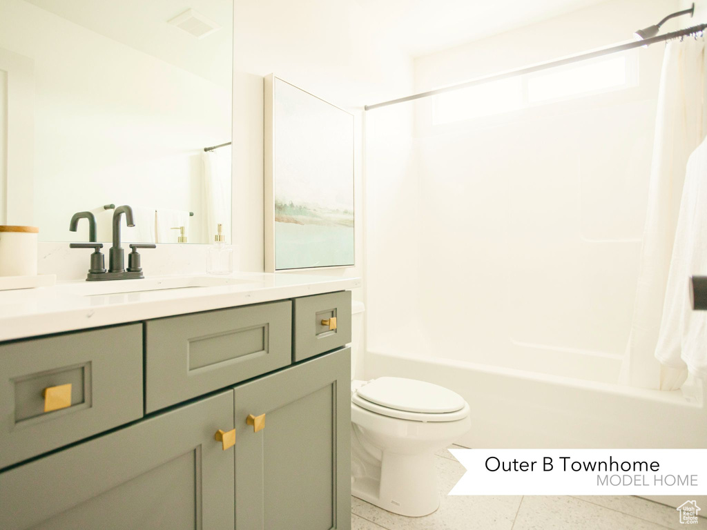 Full bathroom featuring shower / tub combo with curtain, toilet, vanity, and visible vents