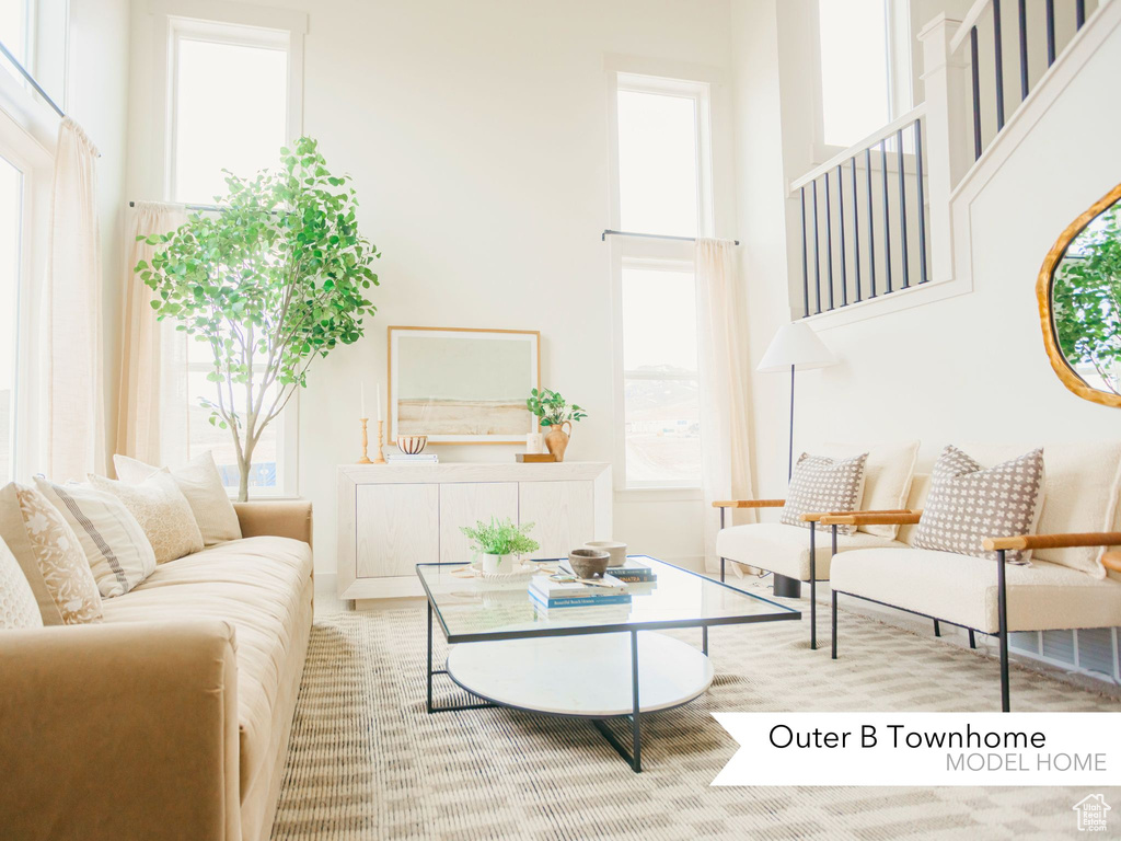 Living area with a towering ceiling
