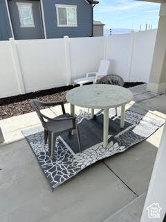 View of patio / terrace featuring fence
