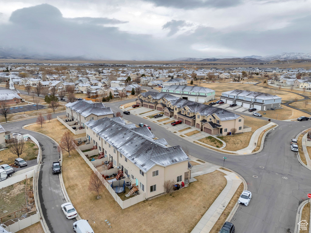 Birds eye view of property featuring a residential view and a mountain view