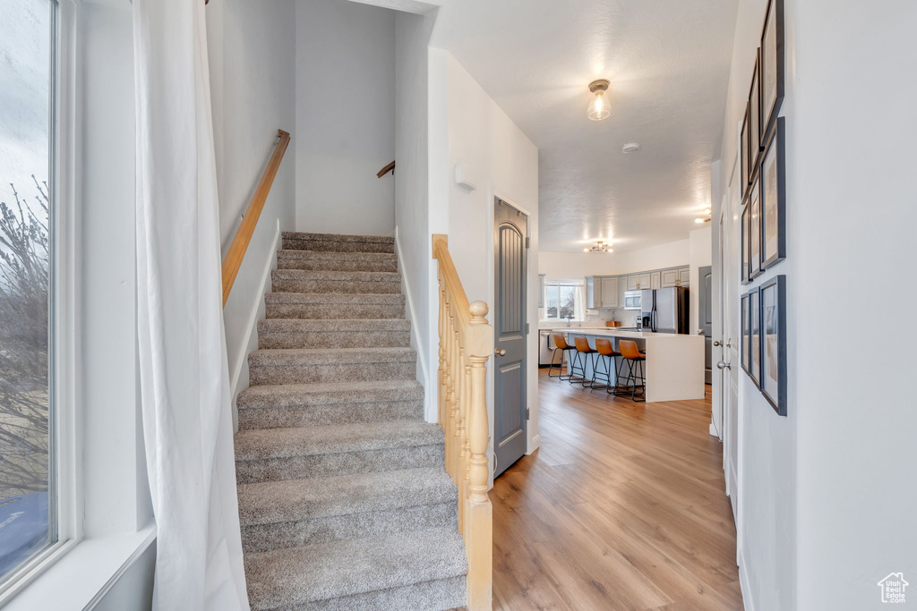 Staircase with wood finished floors
