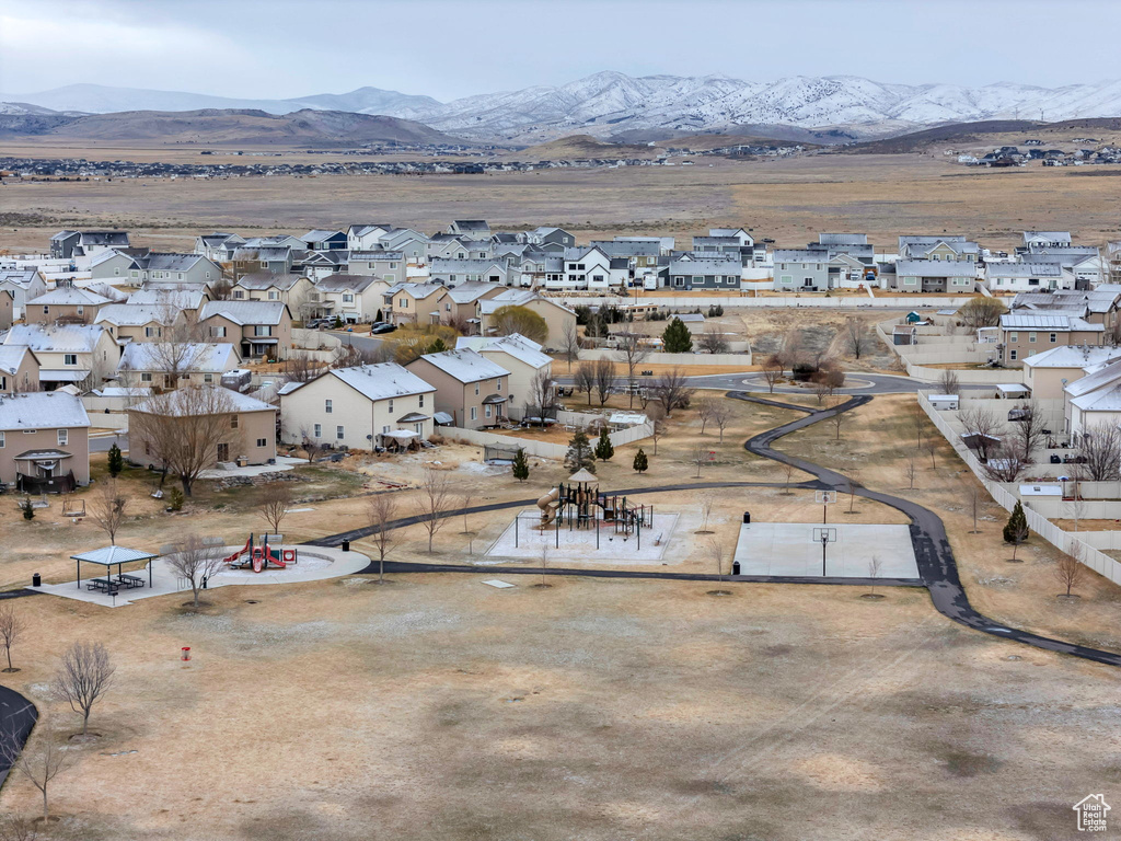 Drone / aerial view with a residential view and a mountain view
