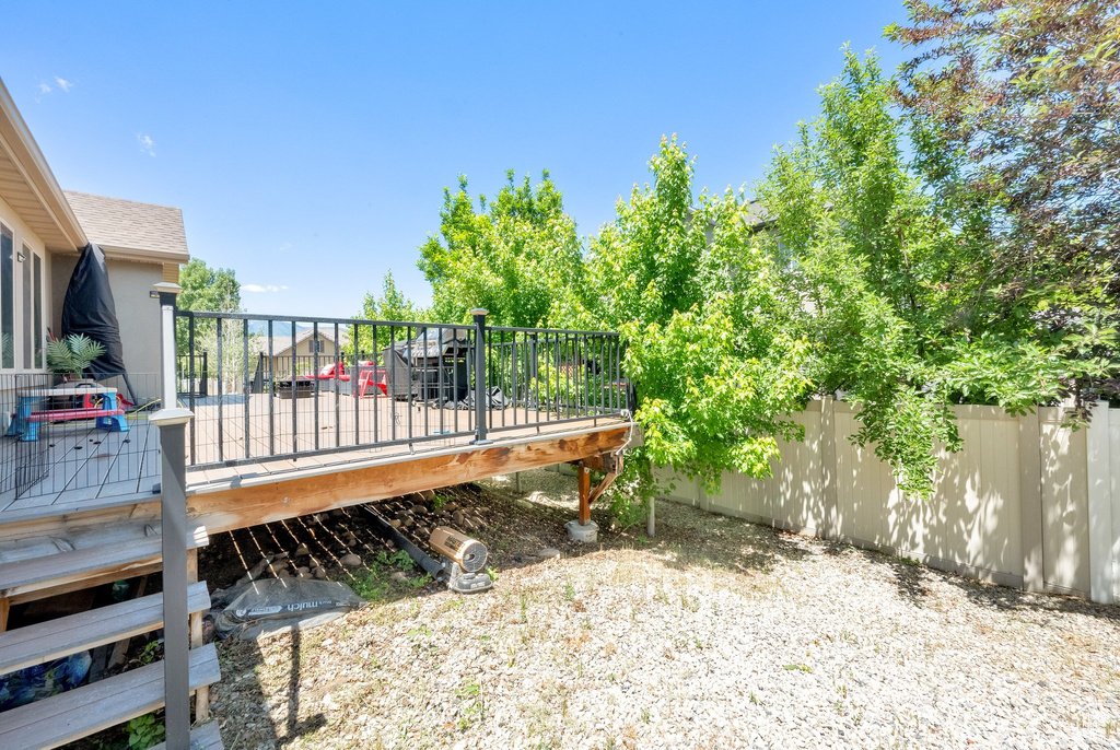 View of yard with a deck