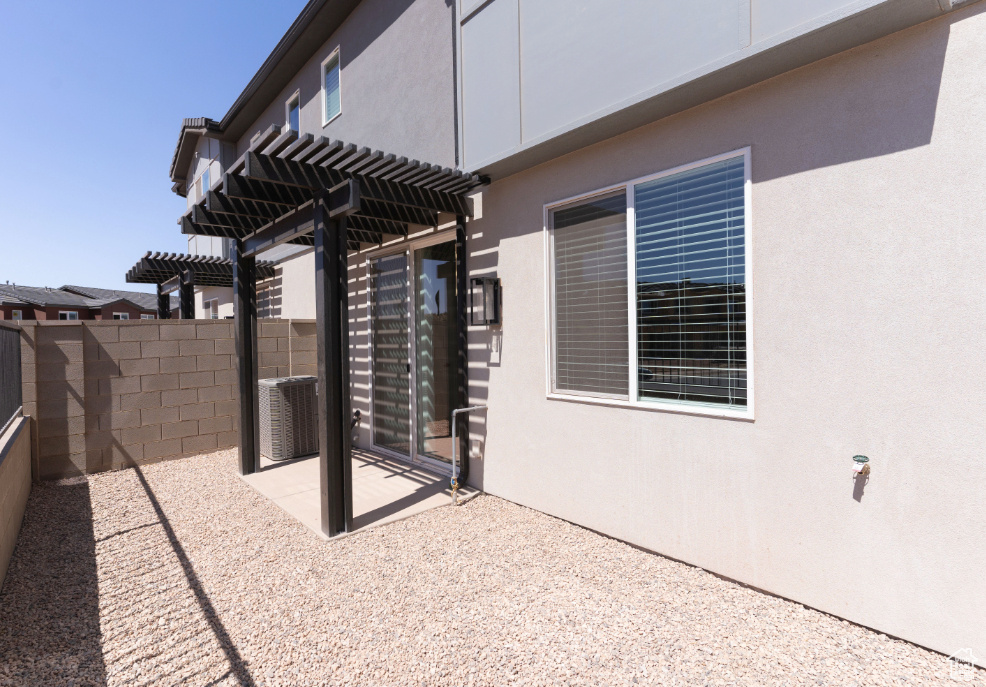 View of patio / terrace featuring a fenced backyard and central AC