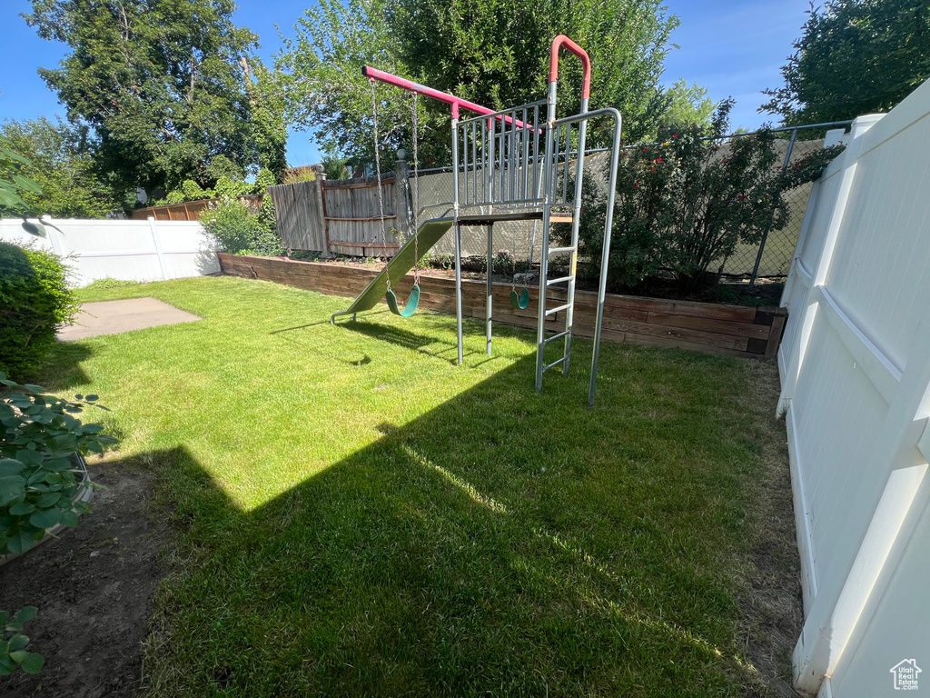 View of yard with a playground