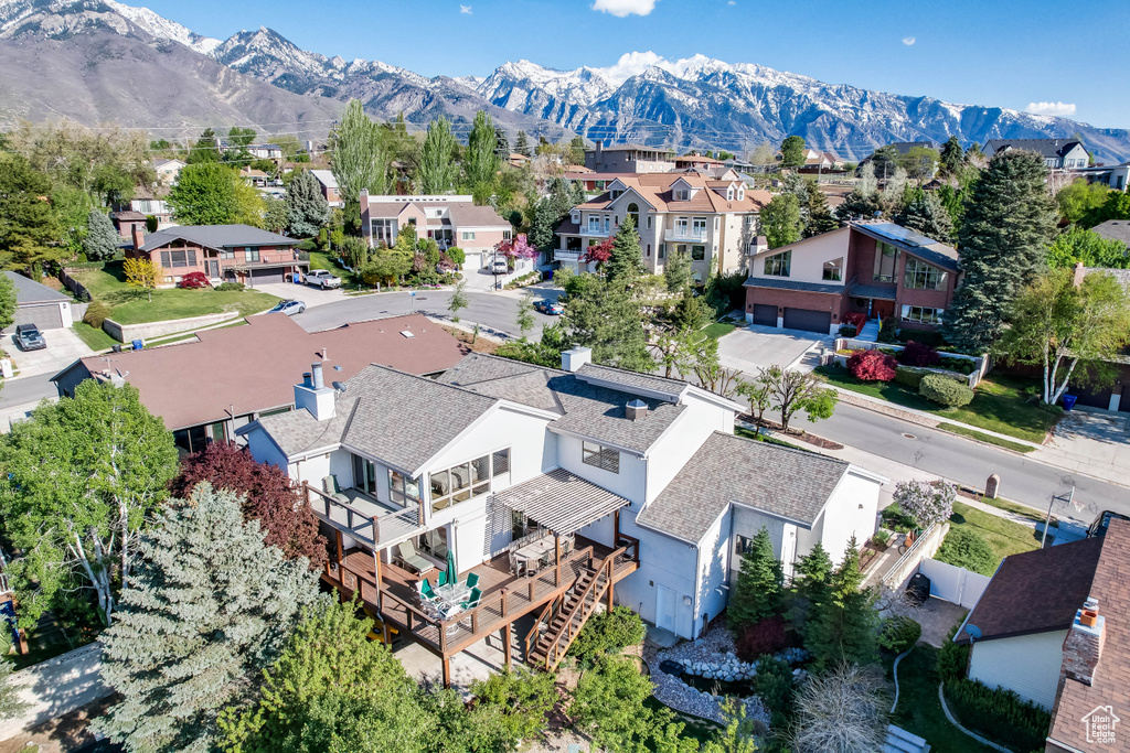 Drone / aerial view with a mountain view and a residential view