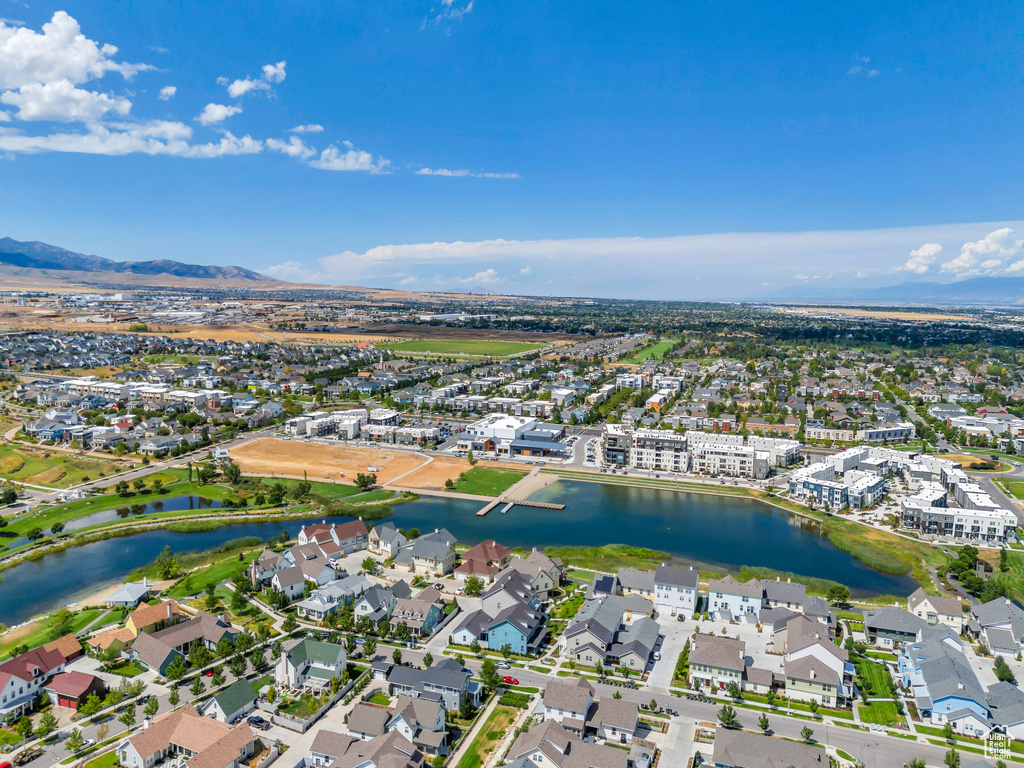 Birds eye view of property featuring a residential view and a water and mountain view