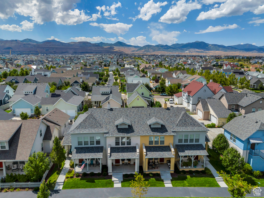 Drone / aerial view featuring a mountain view and a residential view