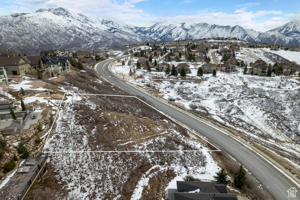Property view of mountains featuring a residential view