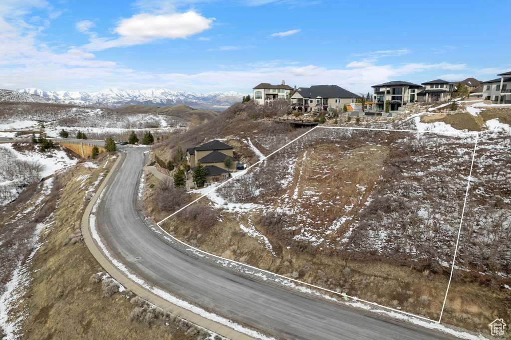 Snowy aerial view with a mountain view