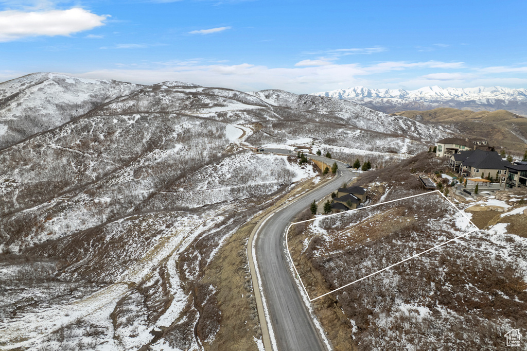 Snowy aerial view with a mountain view