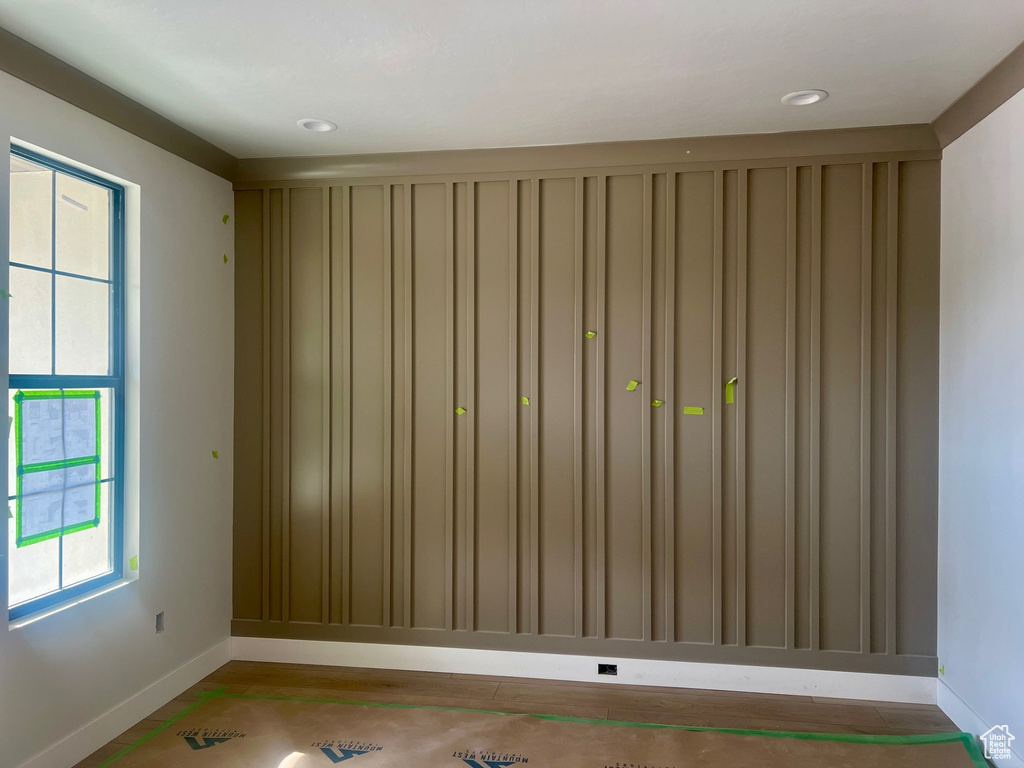 Unfurnished room featuring baseboards