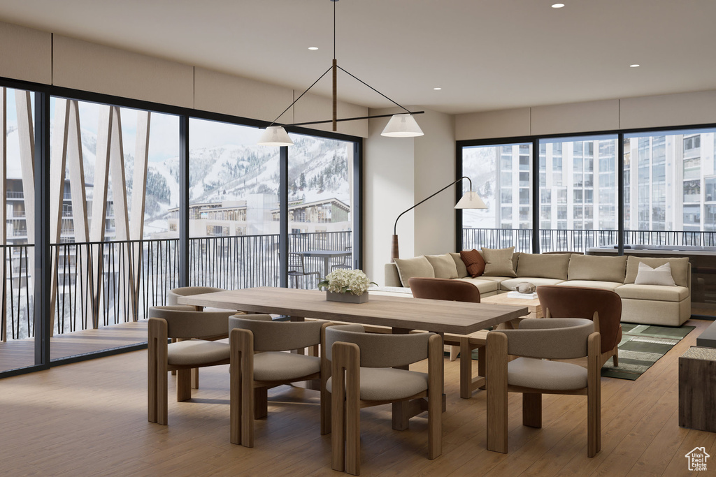 Dining room featuring recessed lighting, a mountain view, and light wood-style floors