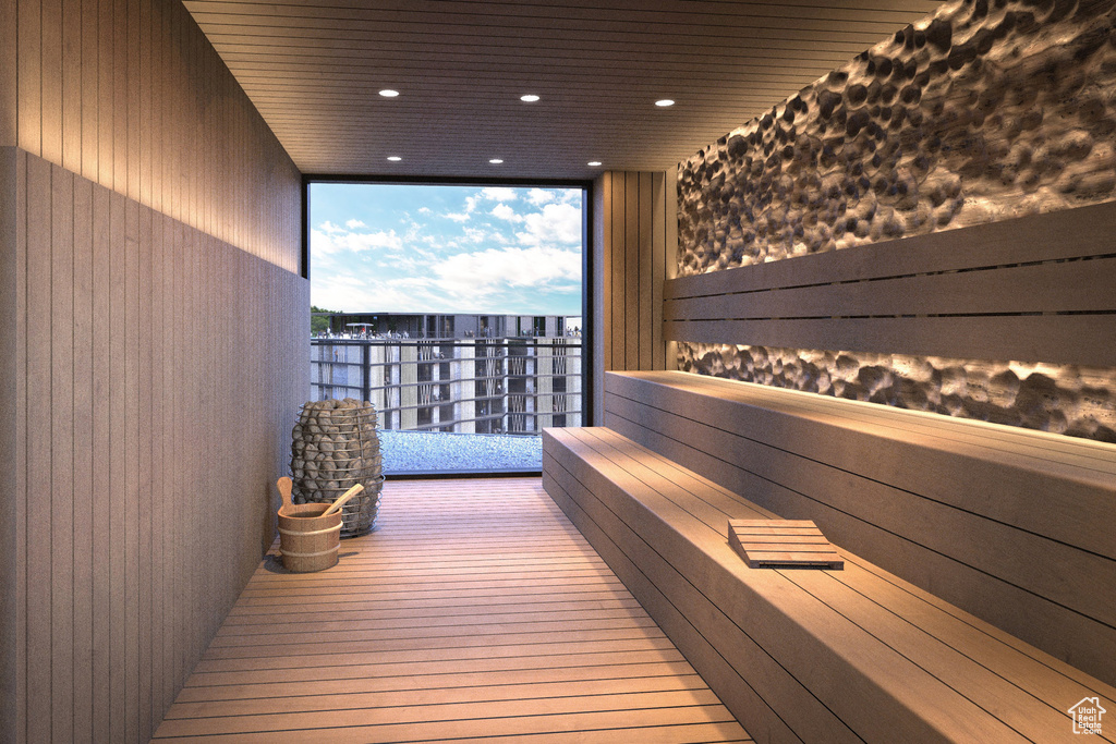 View of sauna with hardwood / wood-style flooring and recessed lighting