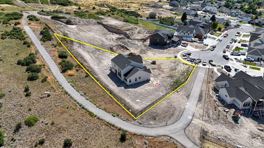 Aerial perspective of suburban area with property boundaries highlighted