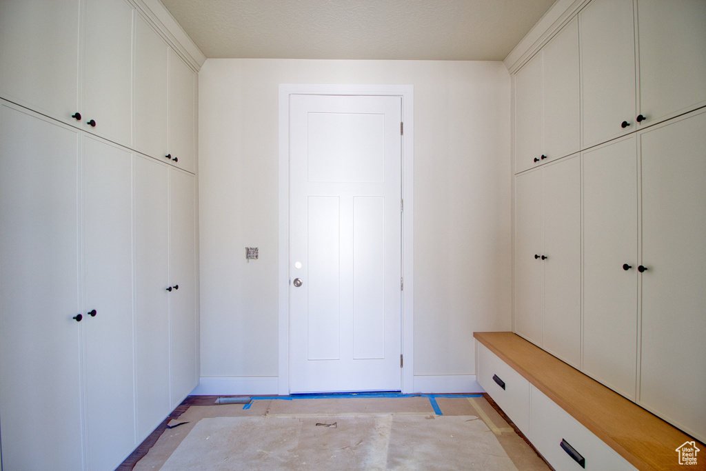 Mudroom featuring baseboards