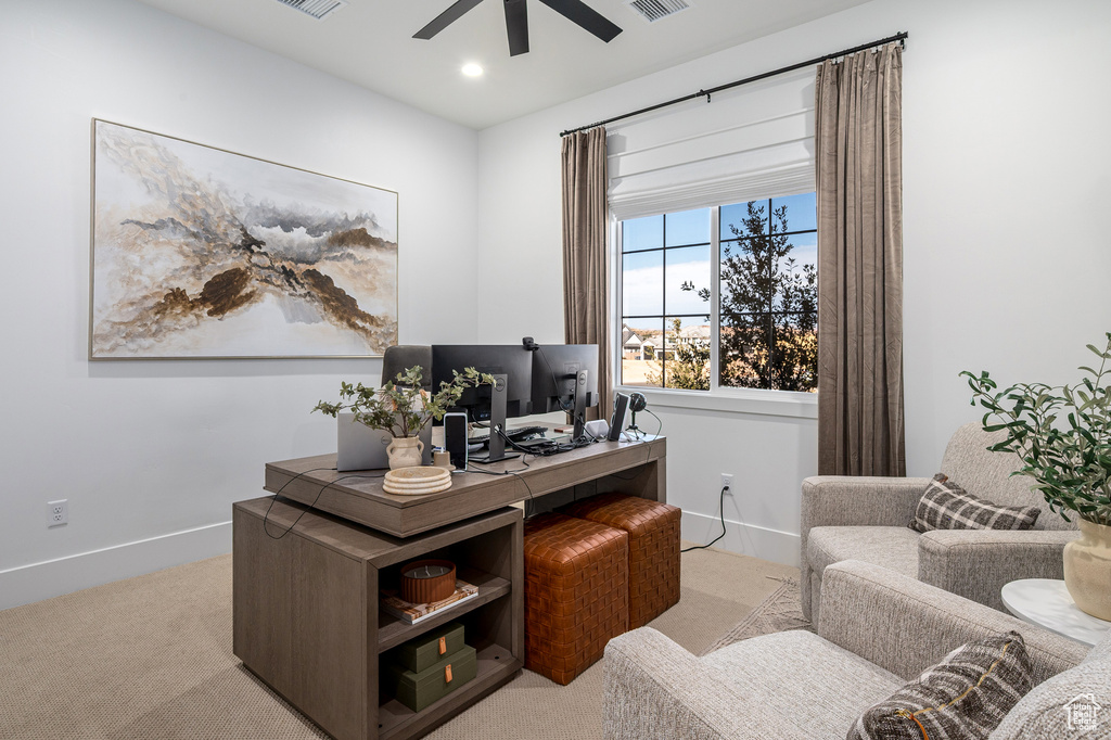 Carpeted office space featuring visible vents, recessed lighting, baseboards, and ceiling fan