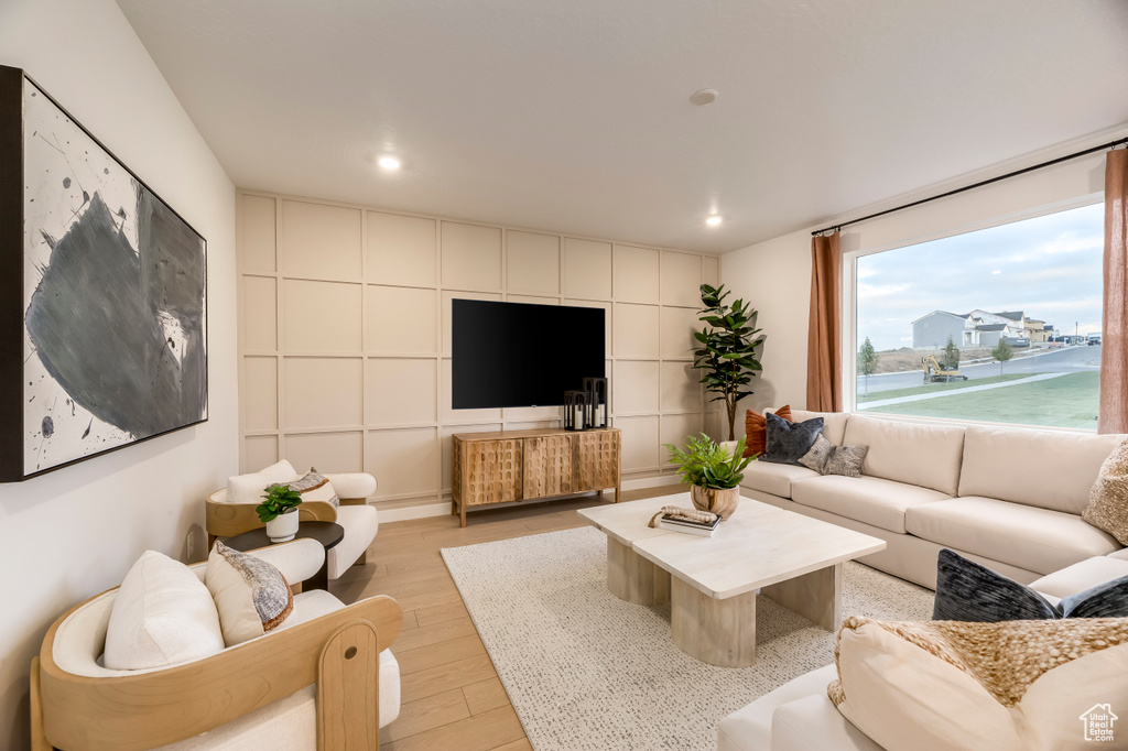 Living room featuring recessed lighting and light wood finished floors