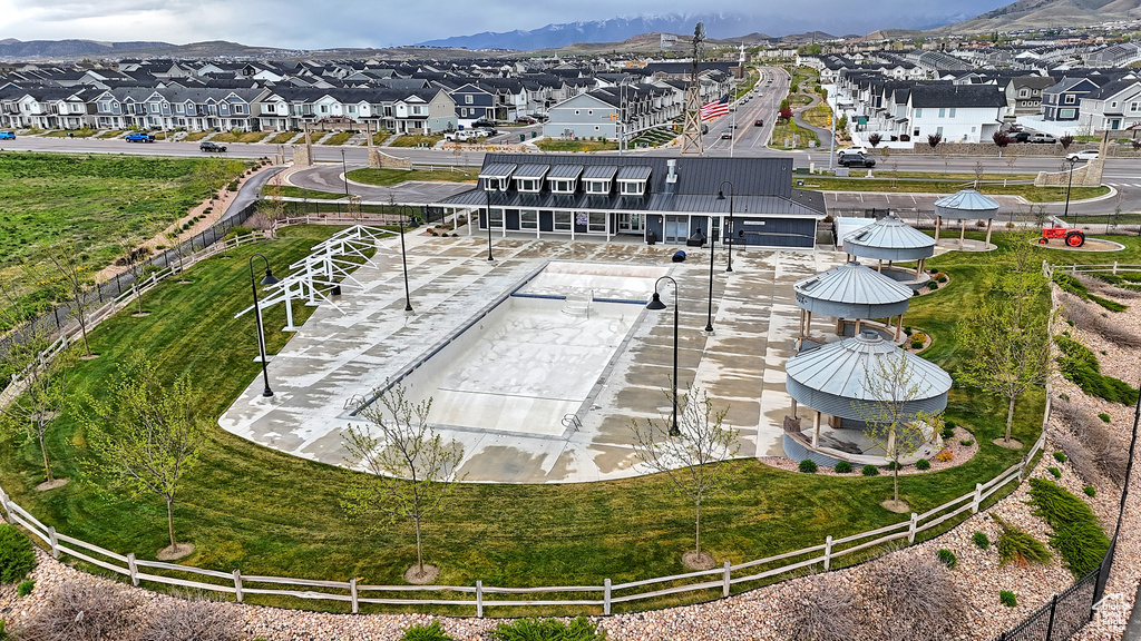 Drone / aerial view with a mountain view and a residential view