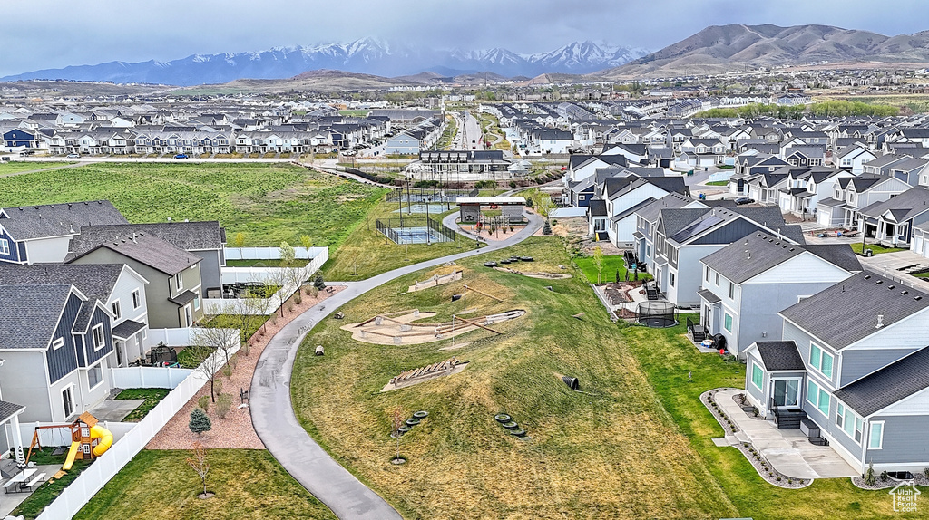 Drone / aerial view featuring a mountain view and a residential view