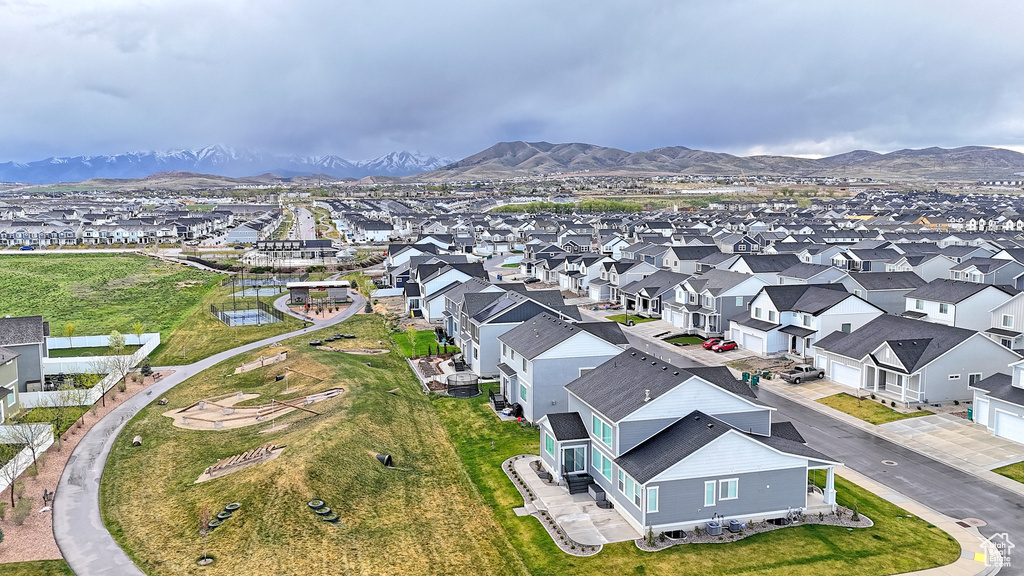 Drone / aerial view with a mountain view and a residential view