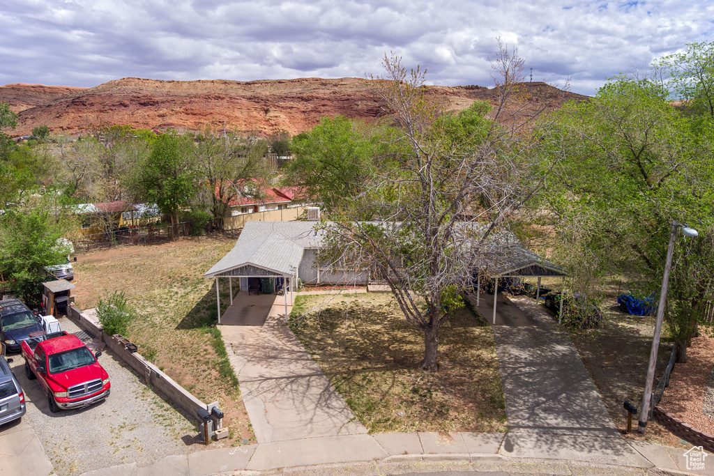 Birds eye view of property featuring a mountain view
