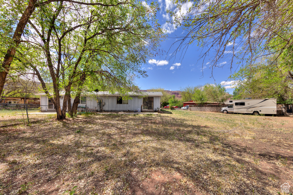 View of yard with fence