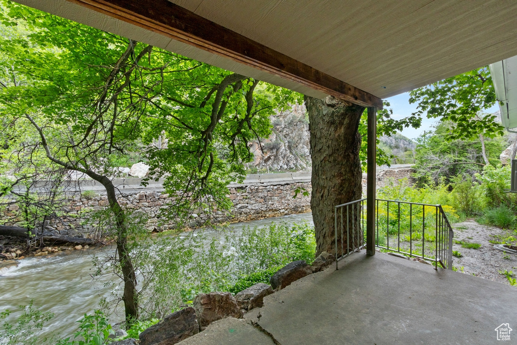 View of patio featuring a water view