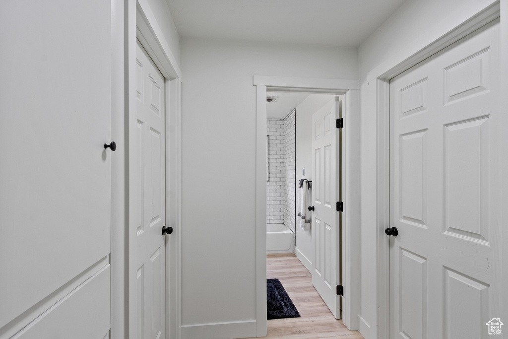 Hall with light wood-type flooring