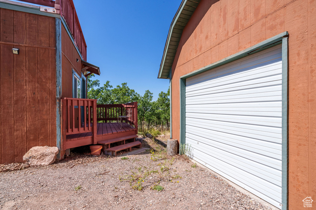 View of yard featuring a wooden deck