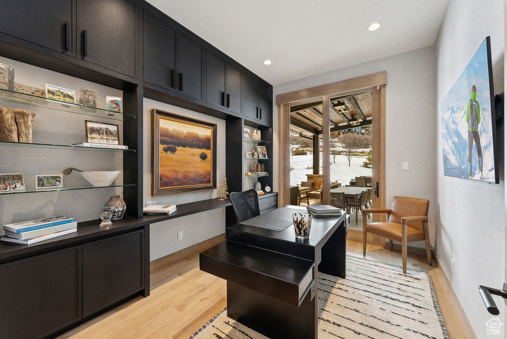 Office space featuring recessed lighting, baseboards, and light wood-style floors