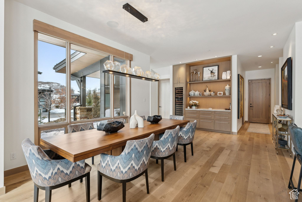 Dining area with recessed lighting, baseboards, and light wood-style floors