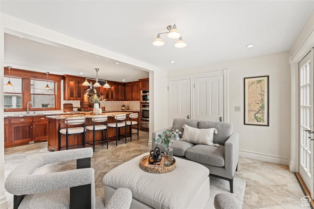 Living room with recessed lighting and baseboards