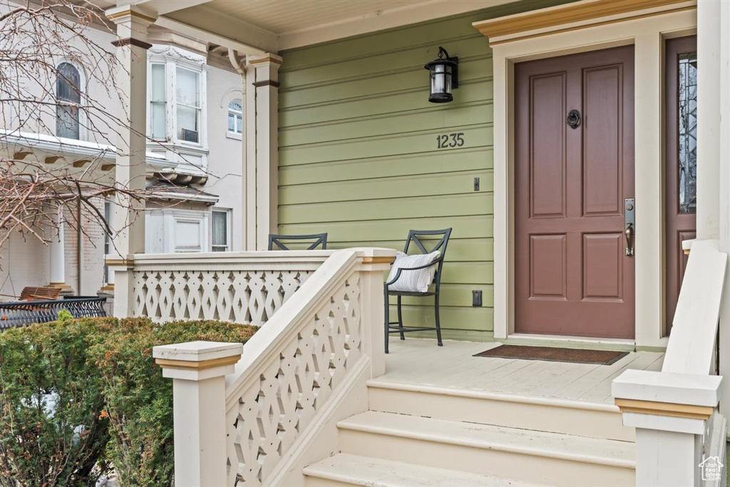 Entrance to property with covered porch