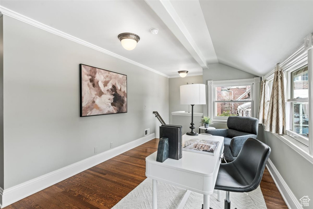 Office area with lofted ceiling, wood finished floors, baseboards, and ornamental molding