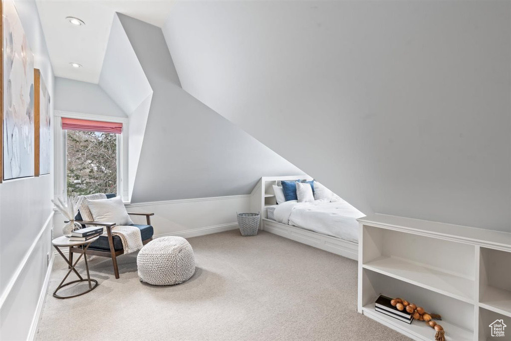 Carpeted bedroom featuring recessed lighting and lofted ceiling