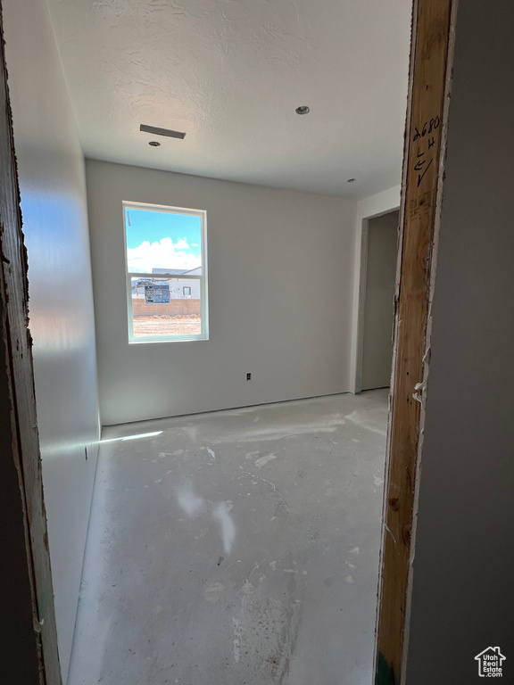 Empty room with concrete floors