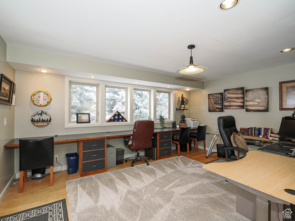 Office area with recessed lighting, wood finished floors, and baseboards
