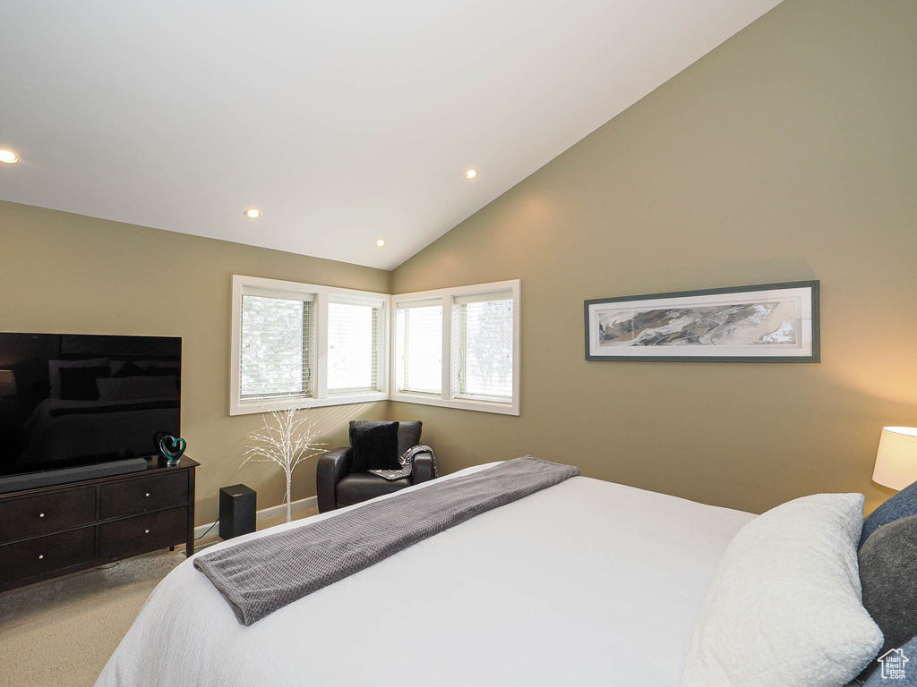 Bedroom featuring vaulted ceiling, carpet flooring, recessed lighting, and baseboards