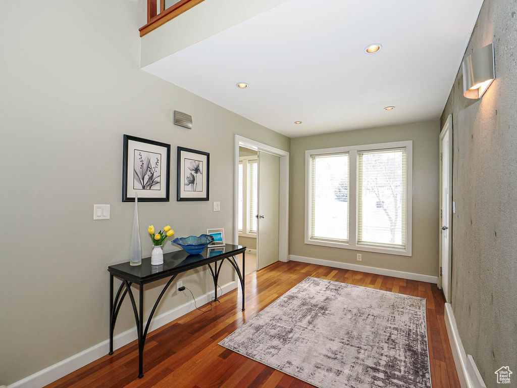 Entrance foyer featuring recessed lighting, baseboards, and wood finished floors