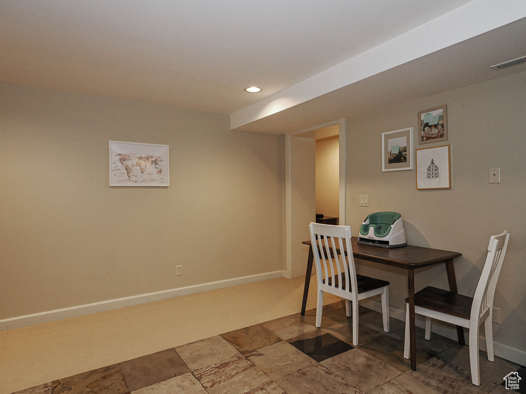 Dining area with recessed lighting, baseboards, and visible vents