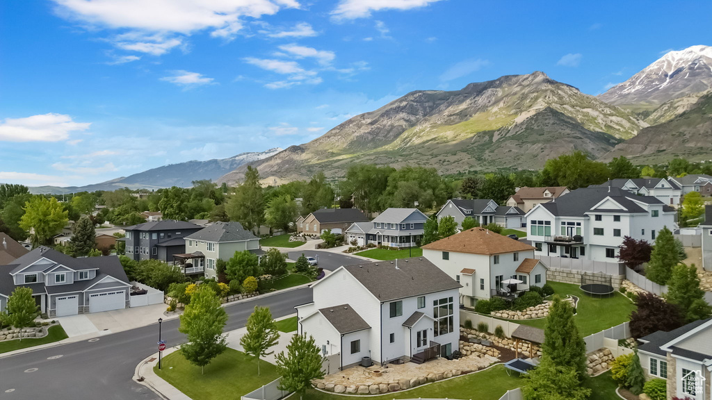 View of mountain backdrop with nearby suburban area