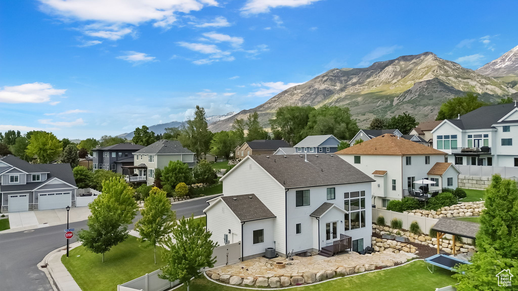 Mountain view featuring nearby suburban area