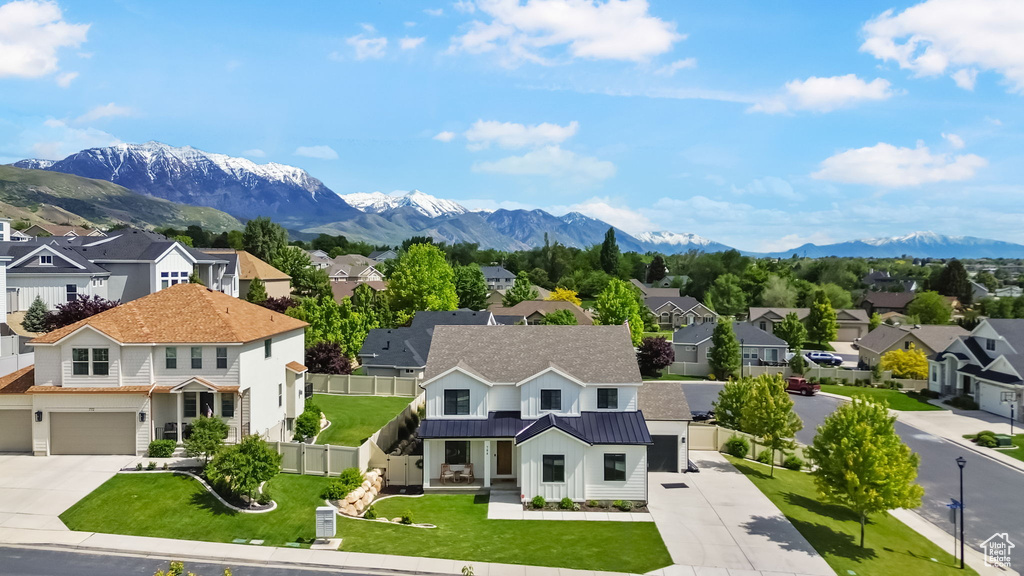 View of mountain backdrop with nearby suburban area