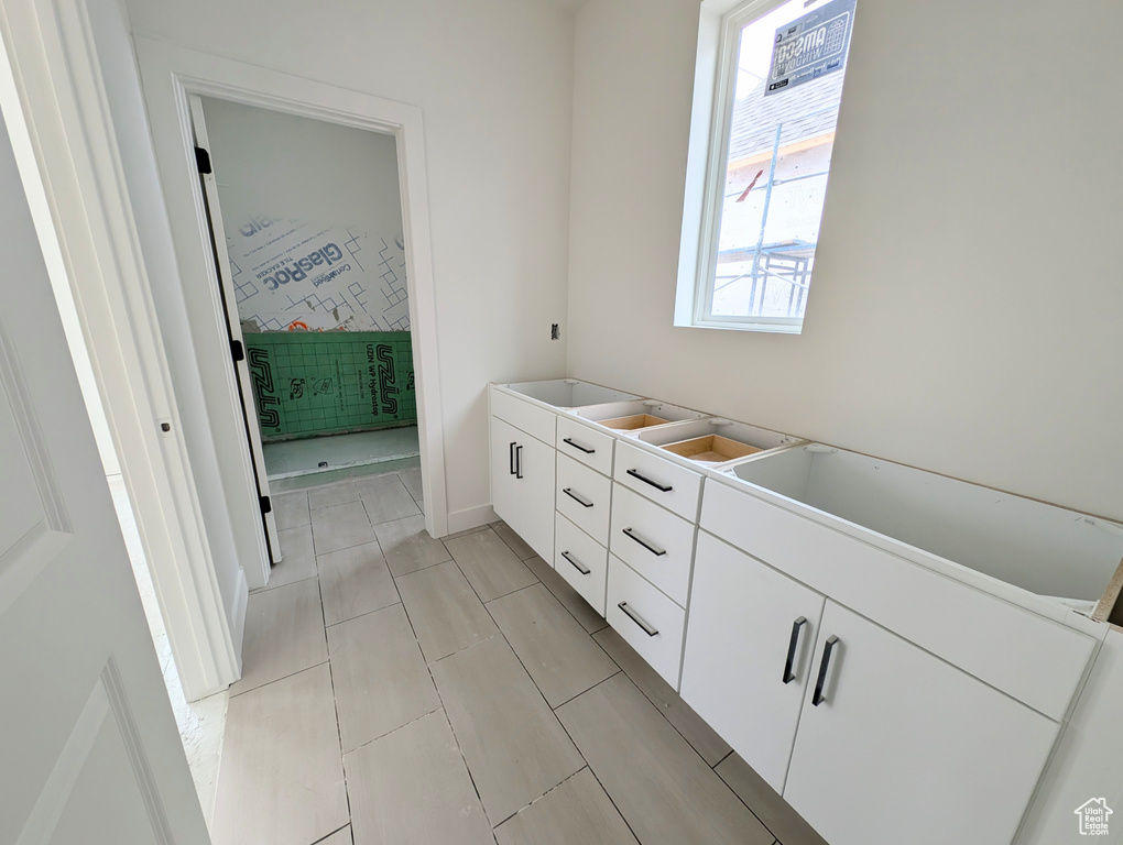 Bathroom featuring tile patterned floors