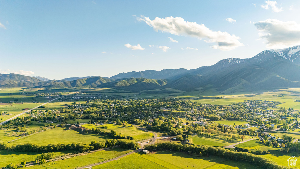View of mountain backdrop with rural landscape