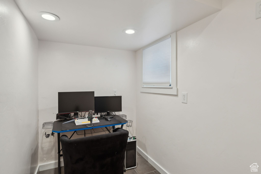 Tiled home office featuring recessed lighting and baseboards