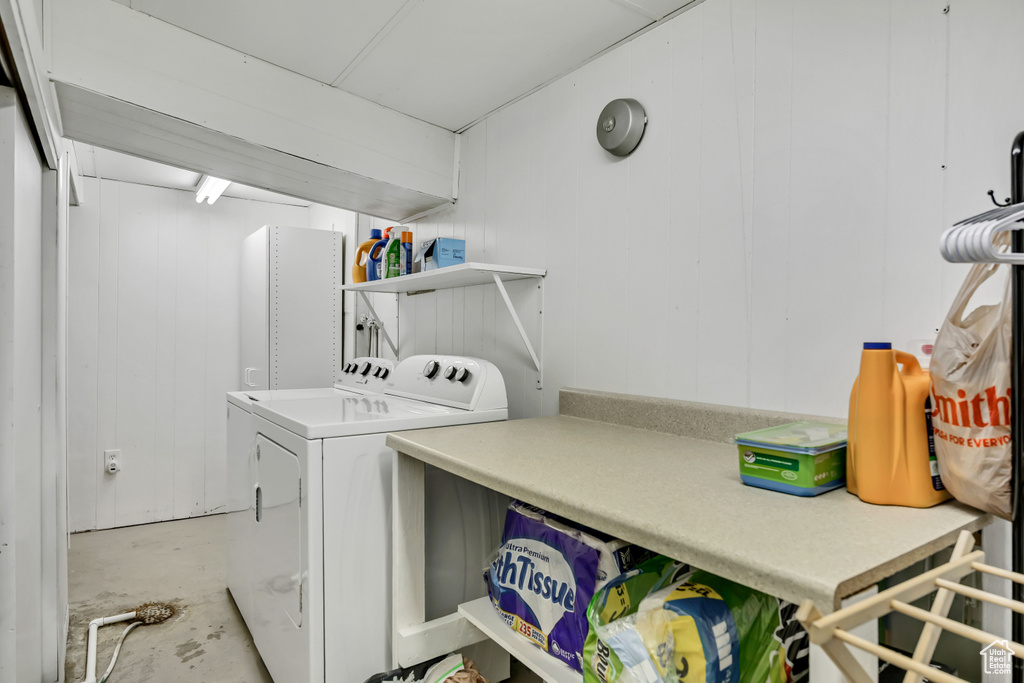 Washroom featuring washer and clothes dryer