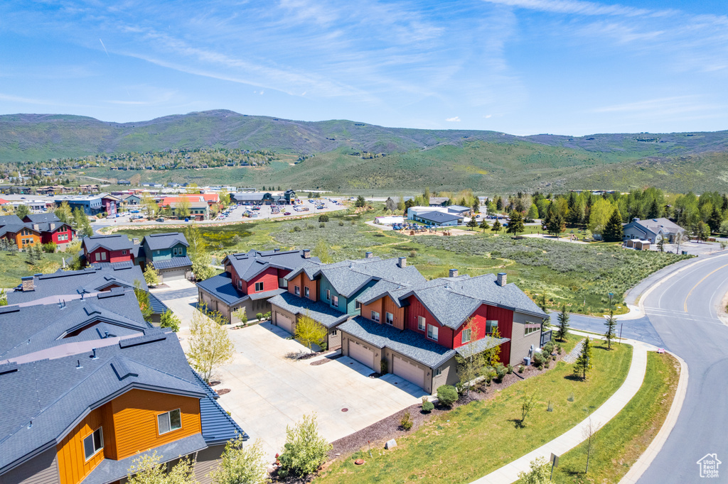 Aerial view of residential area with a mountain backdrop