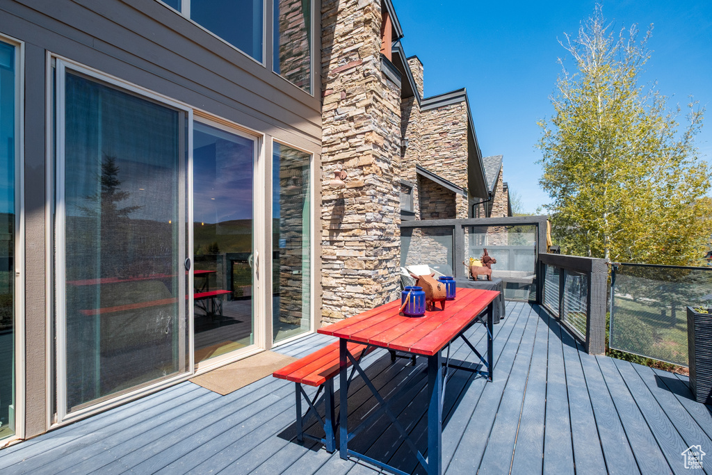 Wooden terrace with a grill